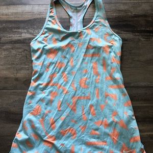 Nike DriFit tank top size small. Stretchy material. Blue and orange